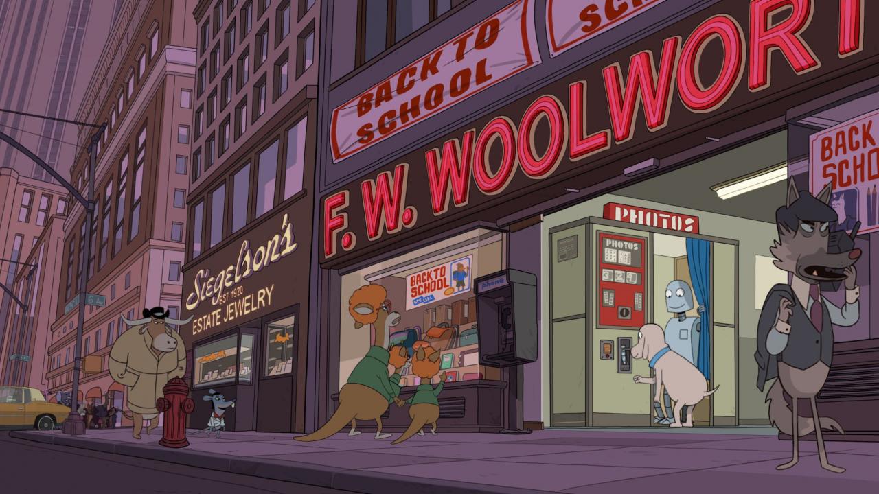 Szenenbild aus dem Animationsfilm ROBOT DREAMS: Eine großstädtische Geschäftsstraße mit hohen Gebäuden, darunter ein Kaufhaus mit rotem "Woolworth"-Schriftzug an der Fassade, in dessen Eingang ein Fotoautomat steht, den ein Hund und ein Roboter gerad